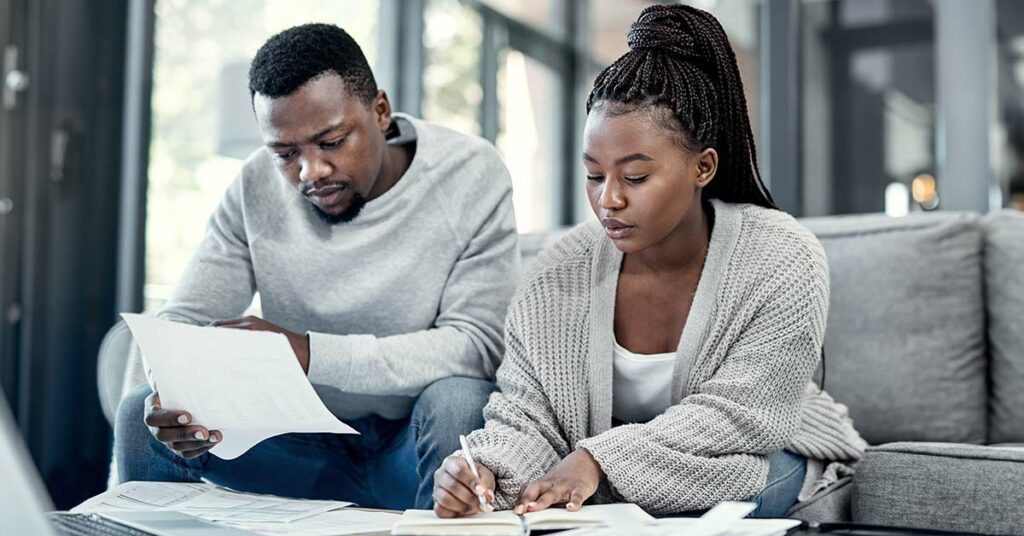 Couple looking at forms.