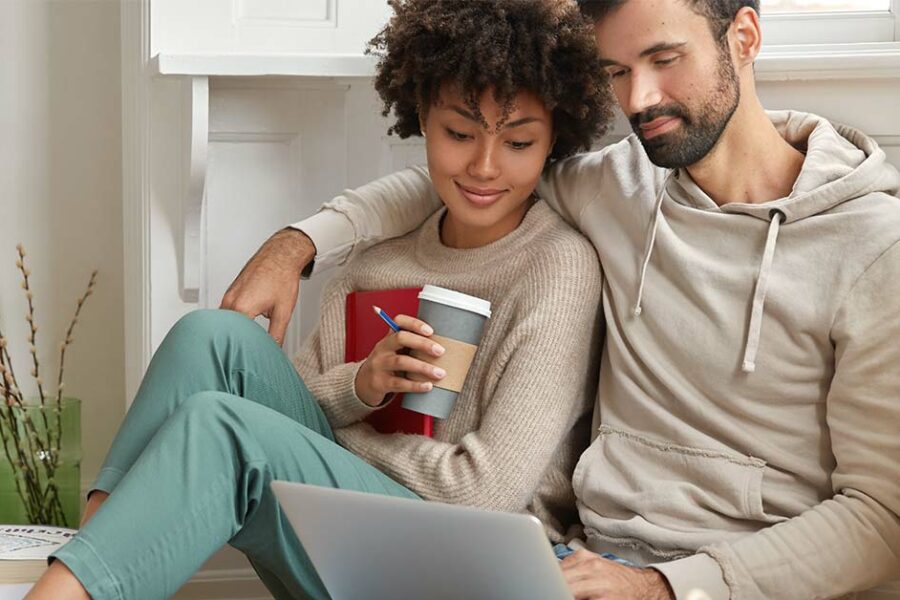 Couple looking at laptop